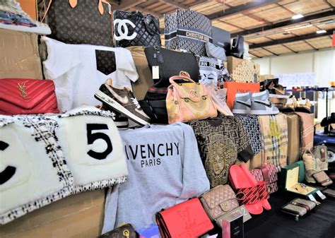 fake clothing fines at airports|counterfeit designer bag fined.